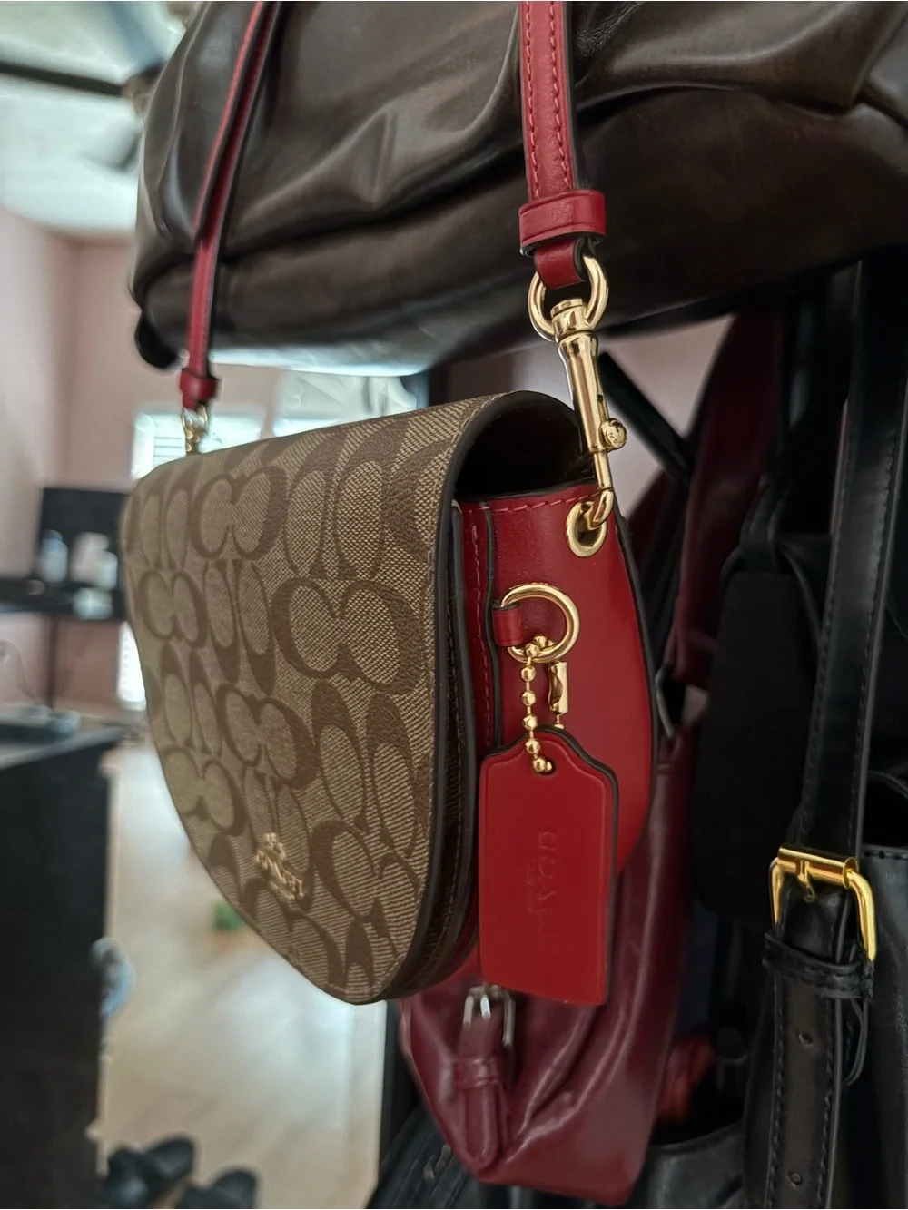 Coach Brown Signature Canvas and Red Leather Saddle Crossbody